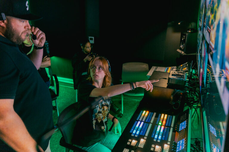 A student and instructor collaborate in Studio215.