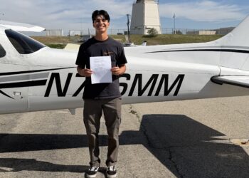 Student pilot on tarmac.