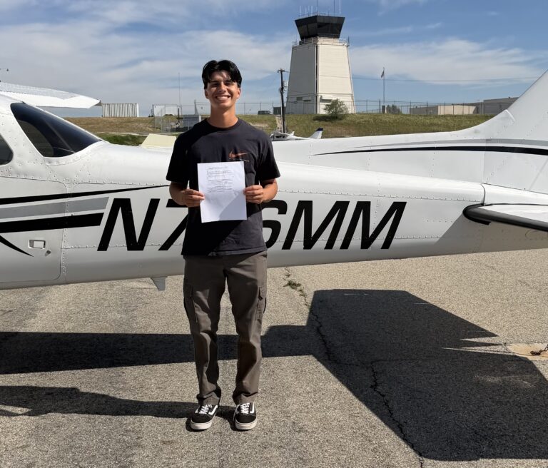 Student pilot on tarmac.
